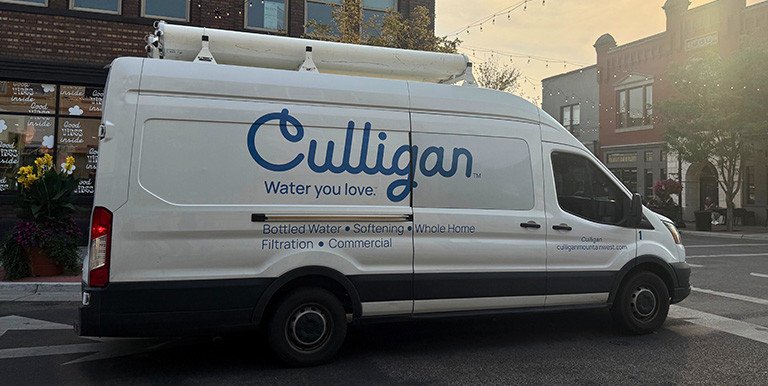Culligan van driving through downtown Idaho Falls